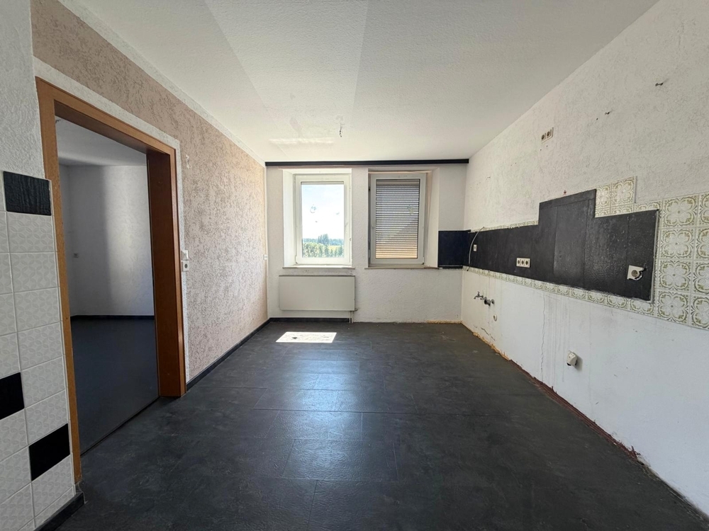 Einfamilienhaus mit zwei Eingängen, Terrasse und Entwicklungspotenzial in Enchenreuth &ndash; Foto 4
